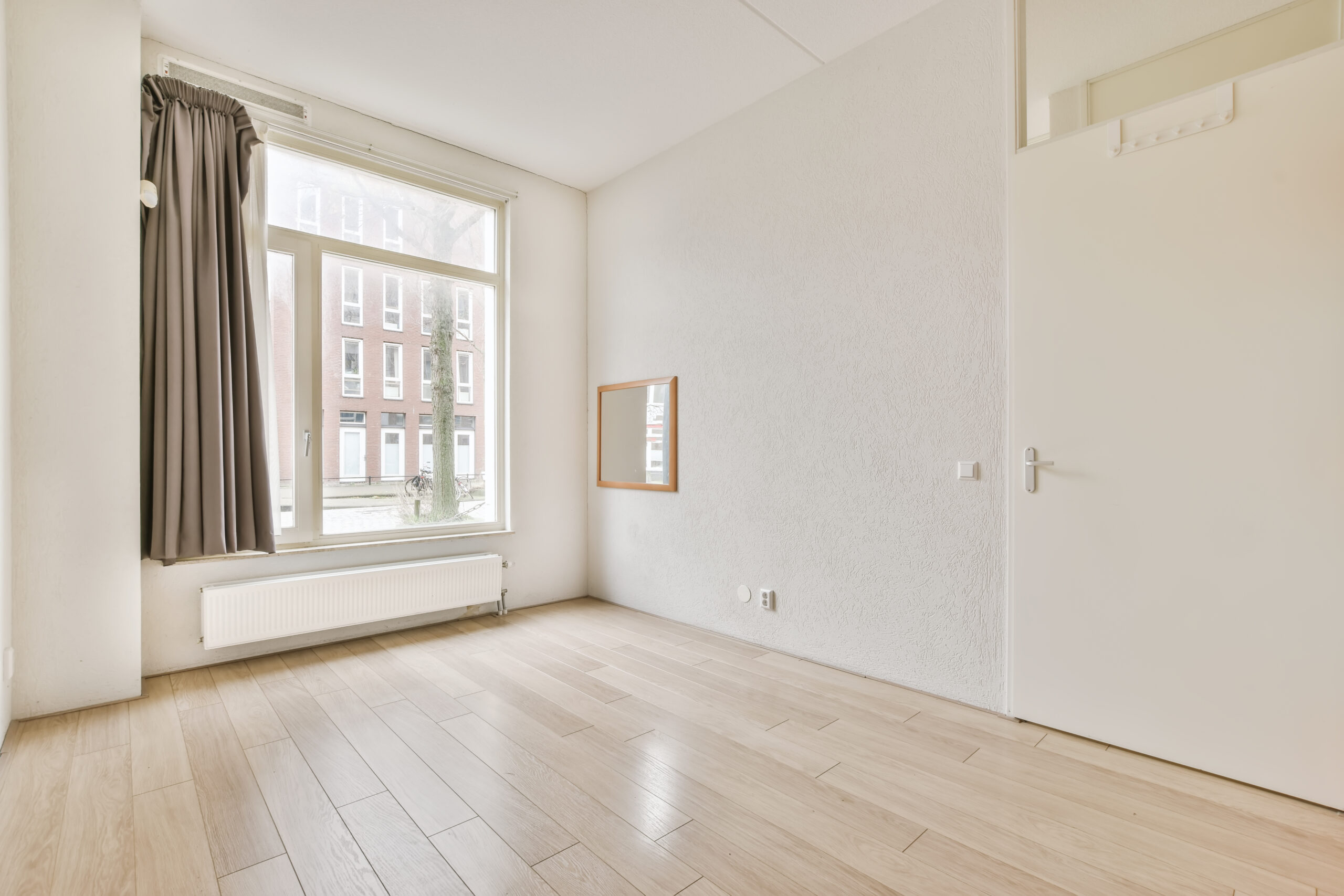 A beautiful room with large windows